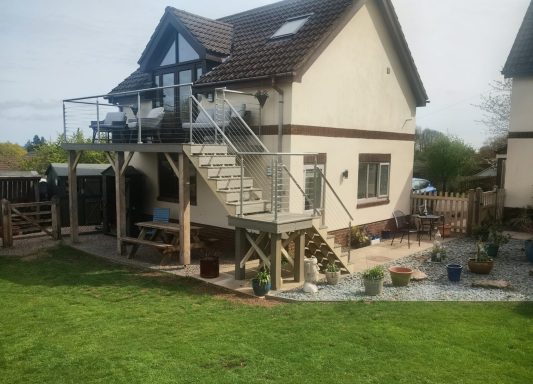 Balcony project Constructed balcony with access stairs and stainless steel handrail components.